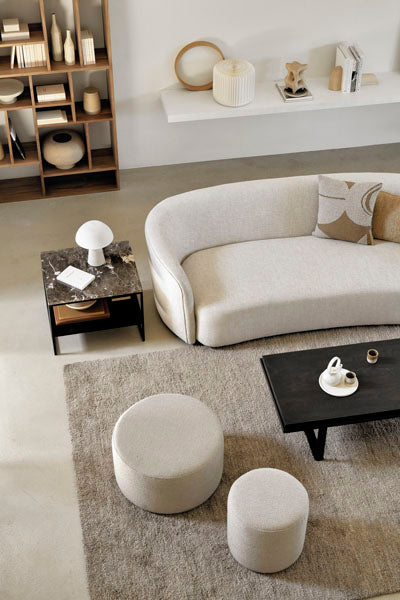 Barrow Pouf by Ethnicraft, showing barrow pouf in live shot.
