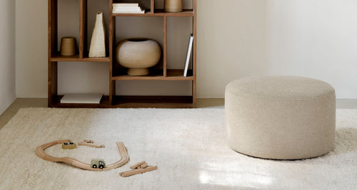 Barrow Pouf by Ethnicraft, showing barrow pouf in live shot.