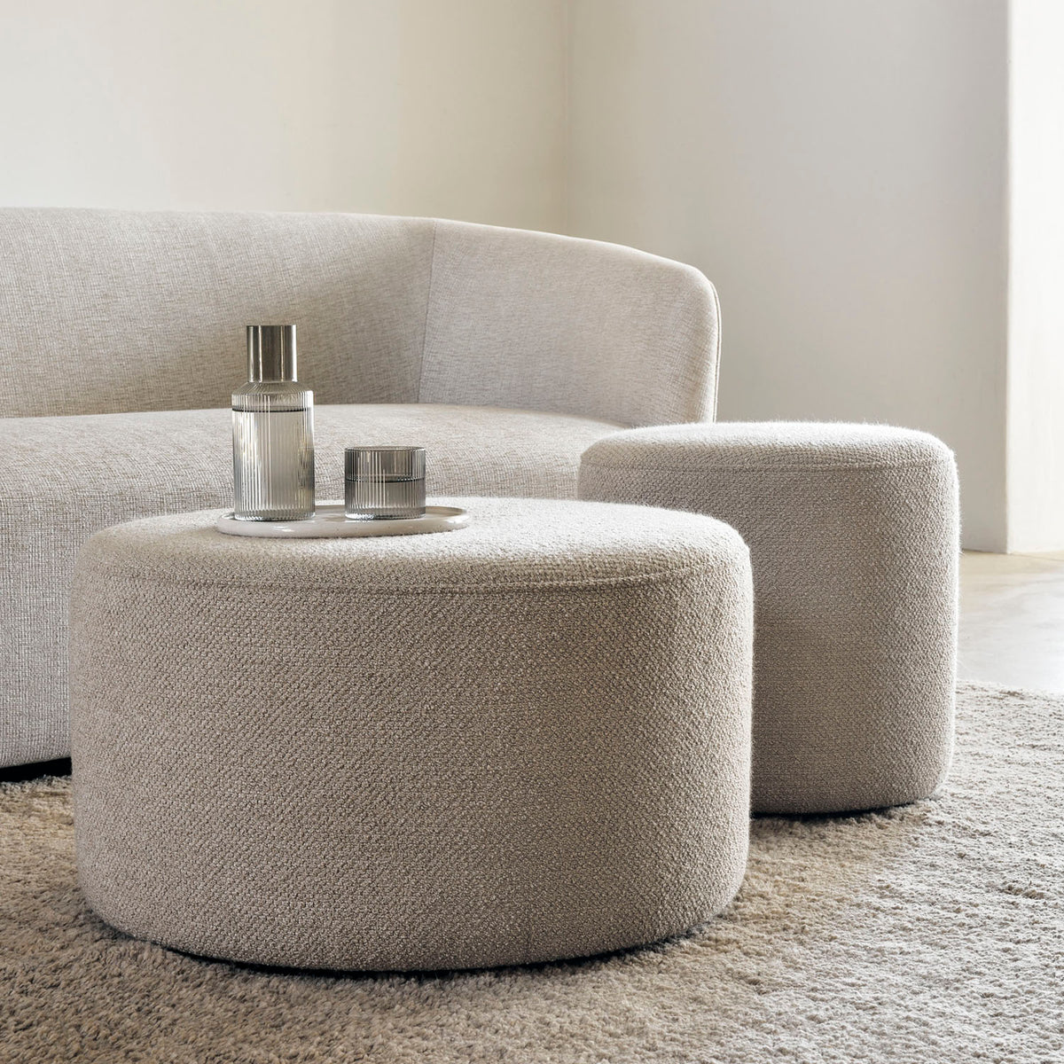 Barrow Pouf by Ethnicraft, showing barrow pouf in live shot.