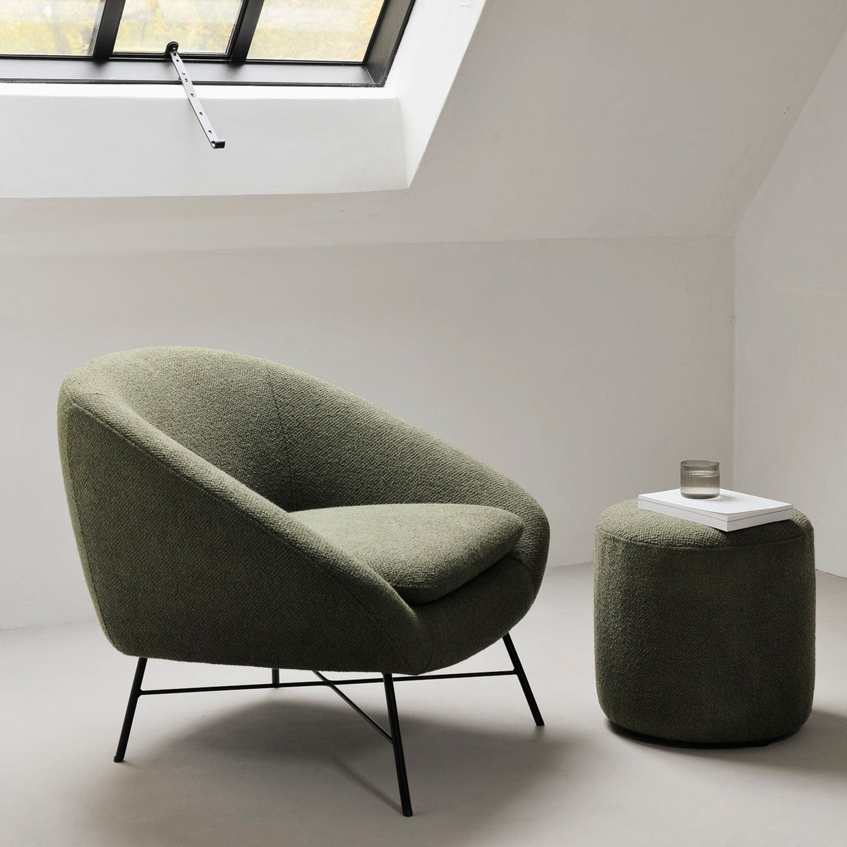 Barrow Pouf by Ethnicraft, showing barrow pouf in live shot.