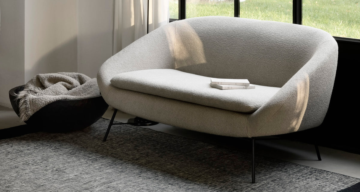 Barrow Sofa by Ethnicraft, showing barrow sofa in live shot.