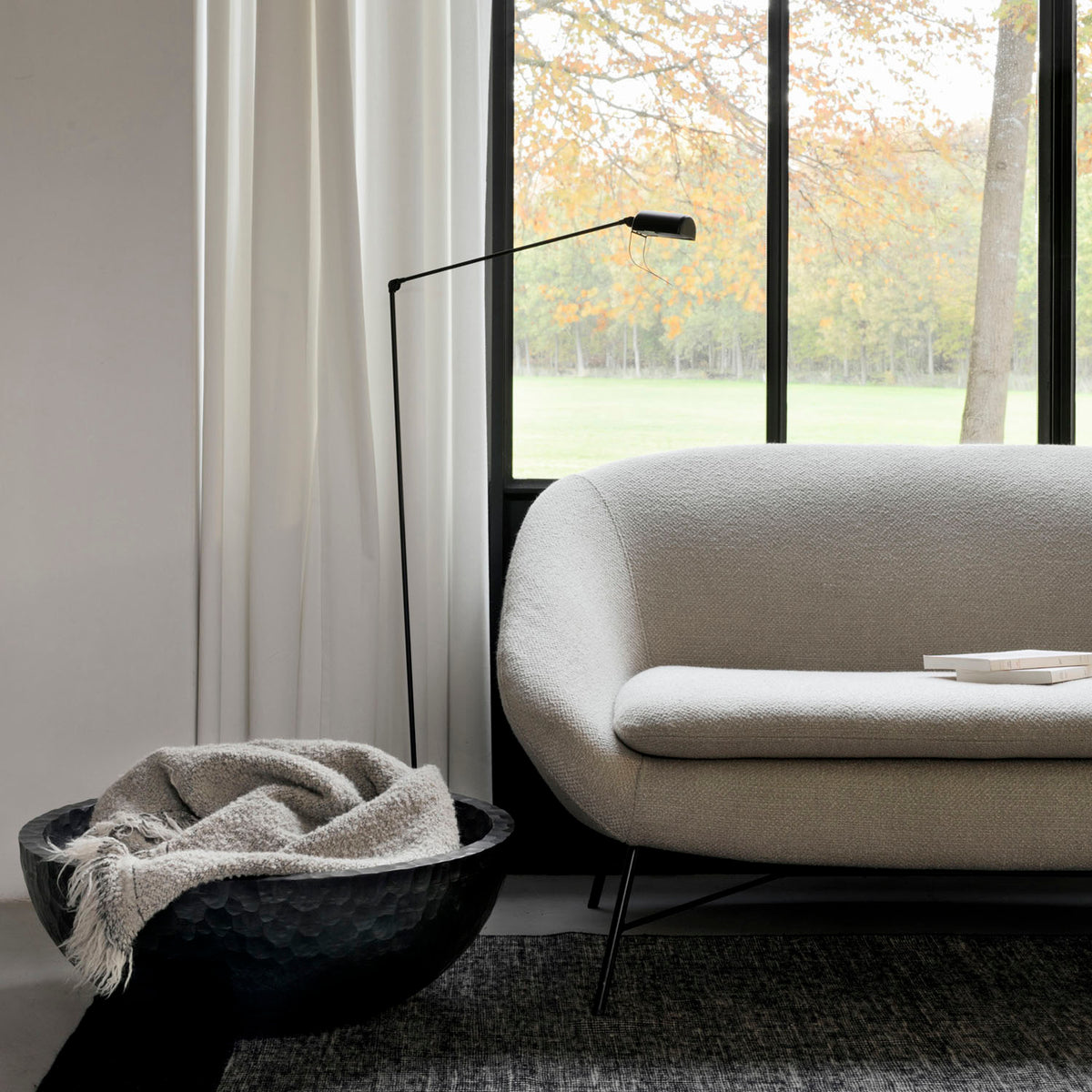 Barrow Sofa by Ethnicraft, showing closeup view of barrow sofa in live shot.