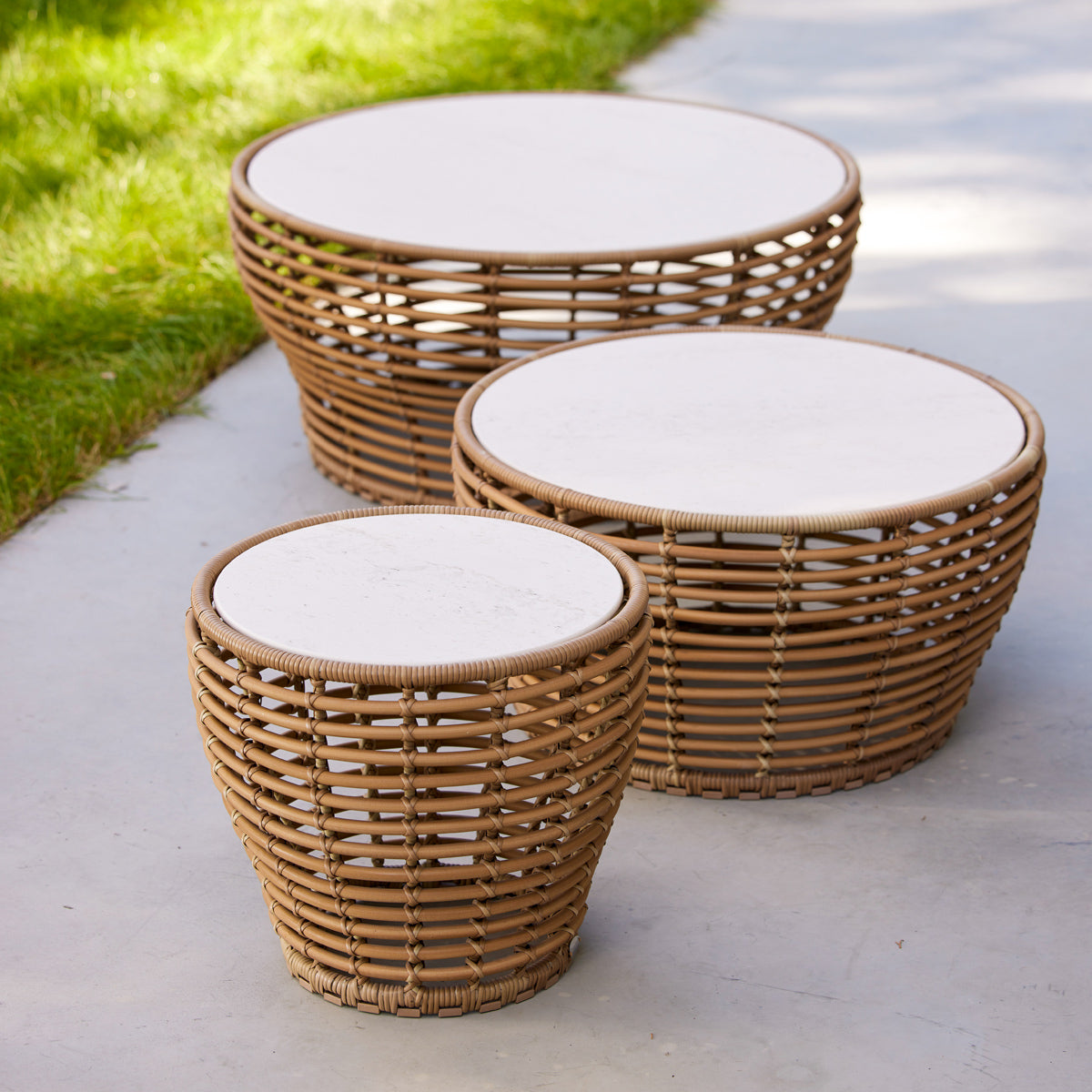 Basket Coffee Table by Cane-Line, showing basket coffee tables in live shot.
