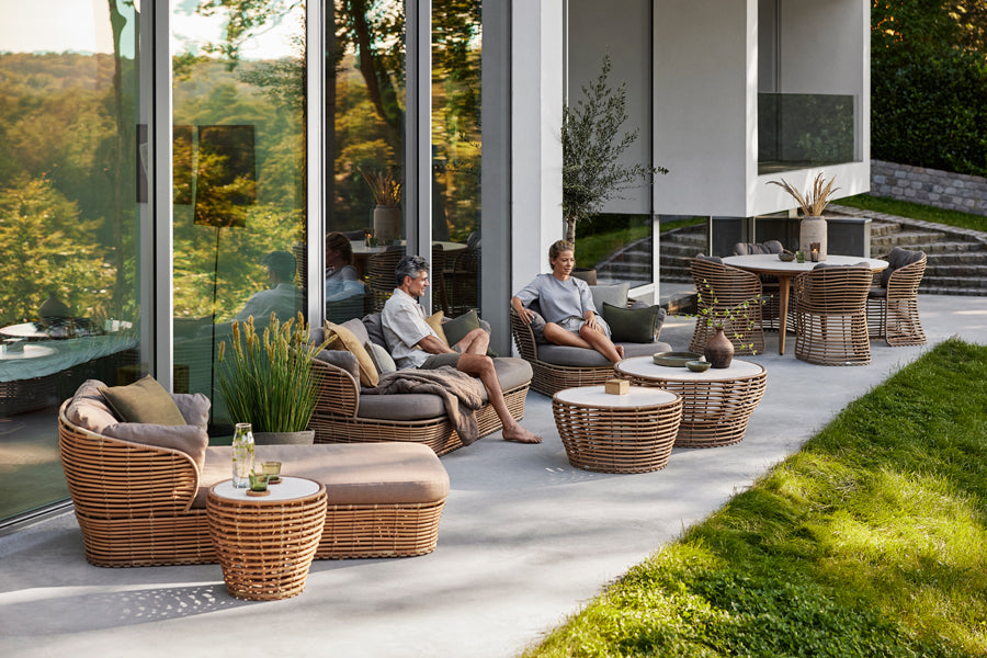 Basket Coffee Table by Cane-Line, showing basket coffee tables in live shot.