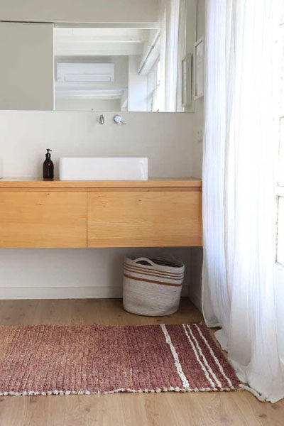 Reversible Basket by Lorena Canals, showing reversible basket in live shot.