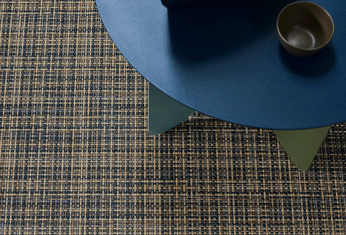 Basketweave Round Large Rug by  Chilewich, showing closeup view of basketweave round large rug in live shot.