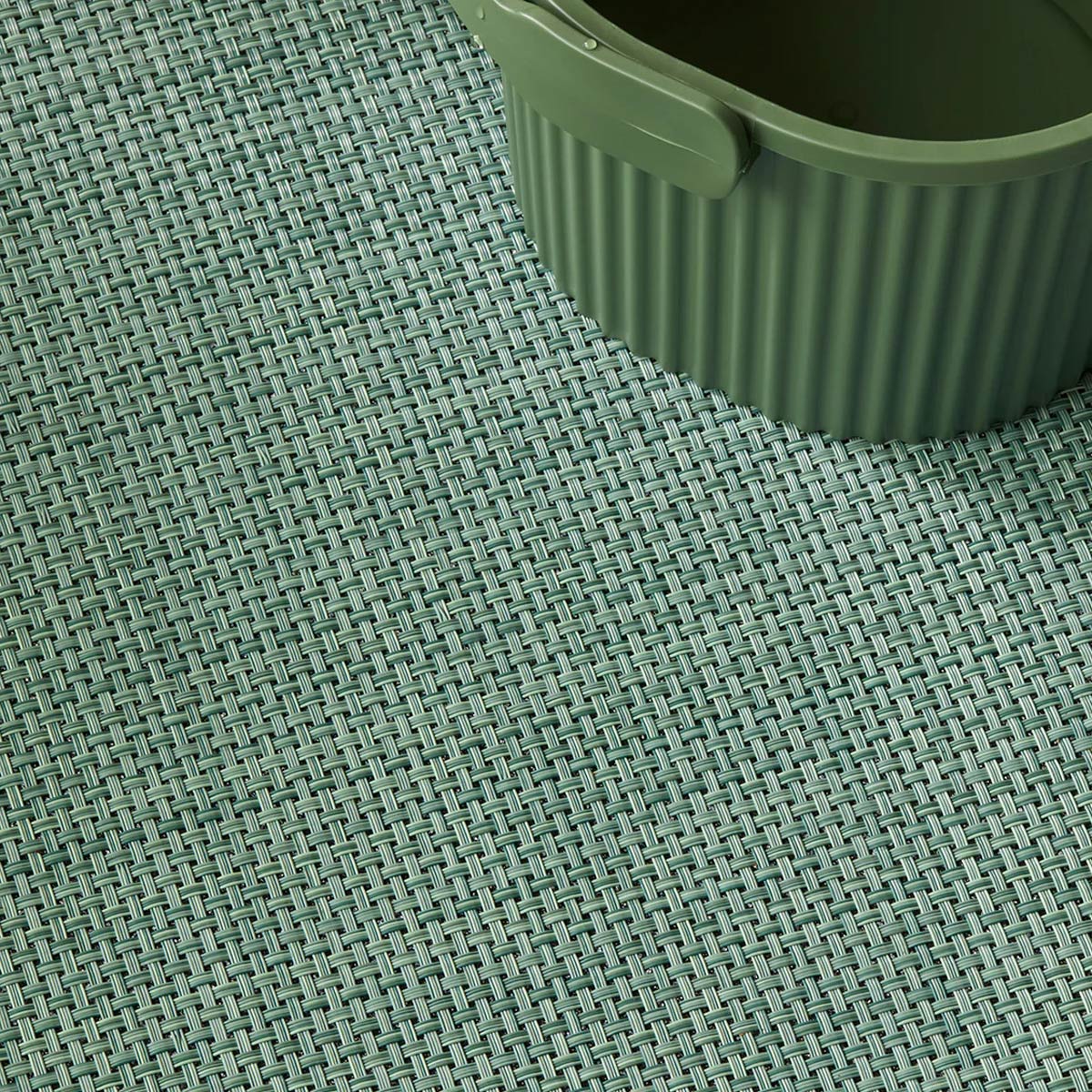 Basketweave Round Large Rug by  Chilewich, showing closeup view of basketweave round large rug in live shot.