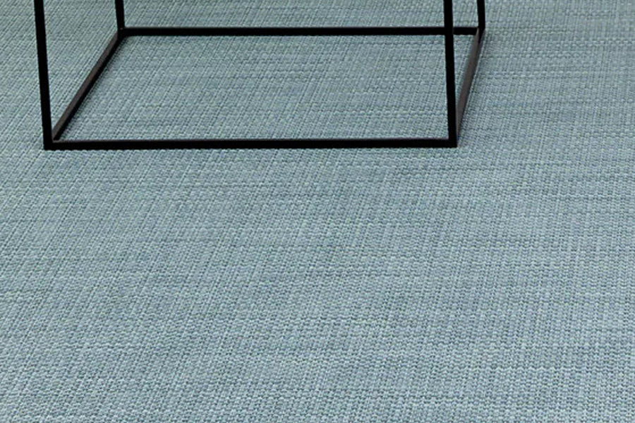 Basketweave Round Large Rug by  Chilewich, showing closeup view of basketweave round large rug in live shot.