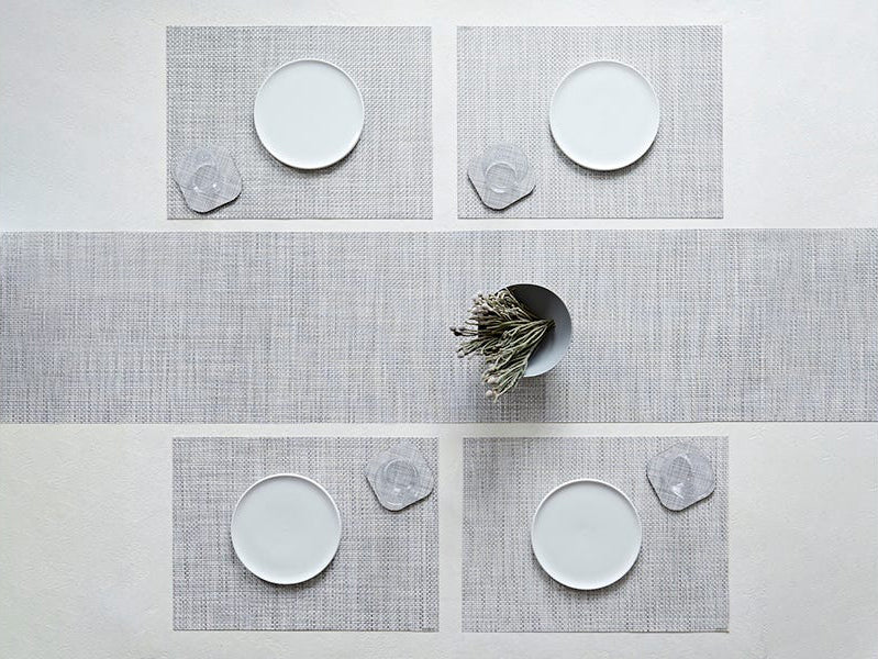 Basketweave Tabletop by Chilewich, showing basketweave tabletops in live shot.