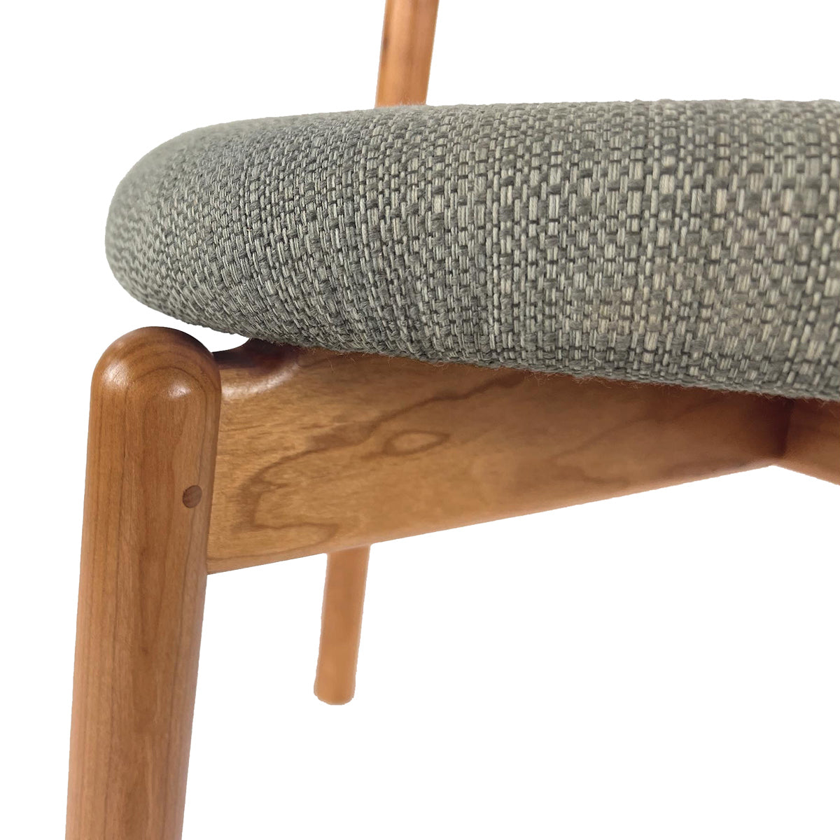 Baton Dining Upholstered Seat Chair - Cherry by Copeland Furniture, showing closeup view of baton dining upholstered seat chair in natural cherry/hemp fabric.