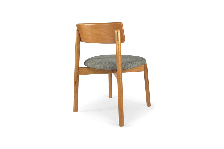 Baton Dining Upholstered Seat Chair - Cherry by Copeland Furniture, showing back angle view of baton dining upholstered seat chair in natural cherry/hemp fabric.