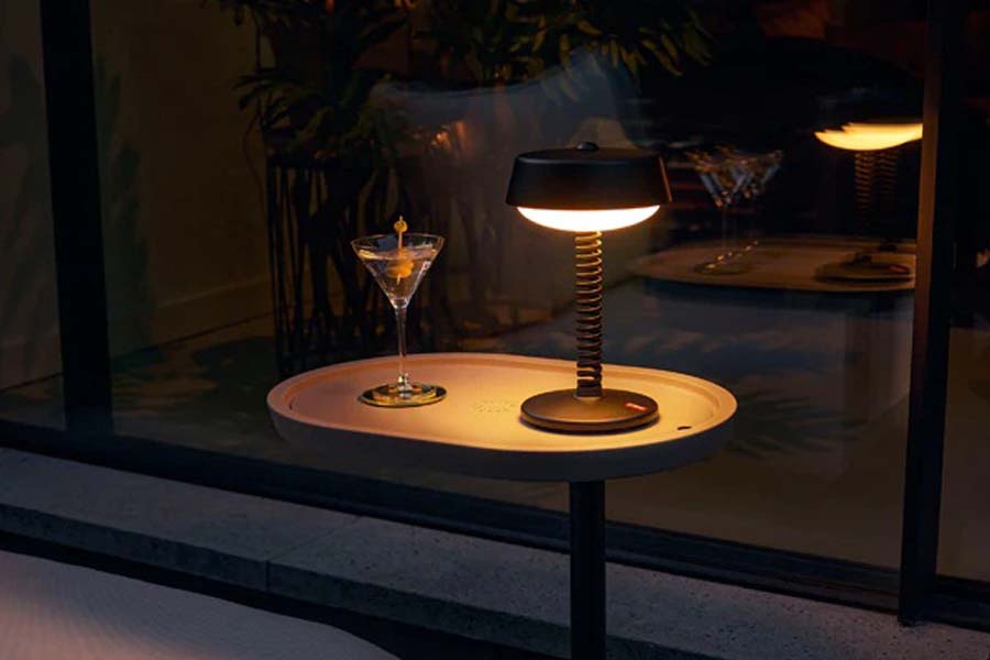 Bellboy Table Lamp by Fatboy, showing bellboy table lamp in live shot.