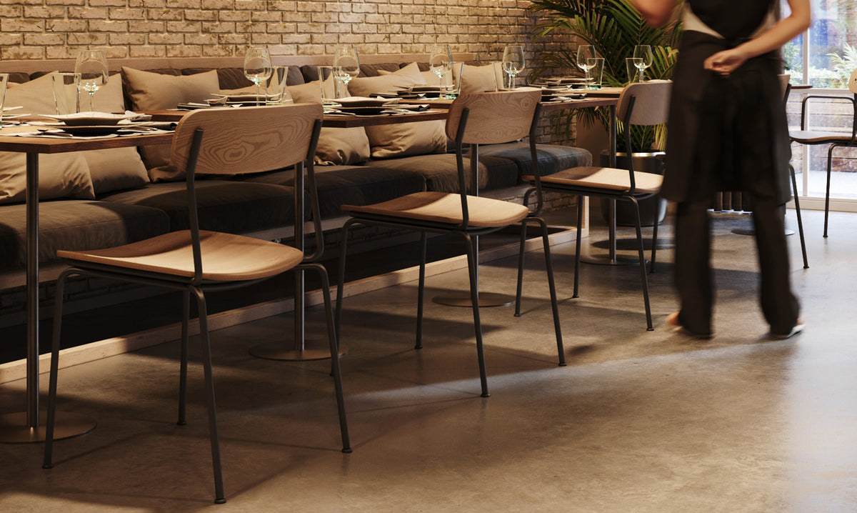 Bellevue Armchair by Kollektiff, showing closeup view of bellevue armchair in live shot.