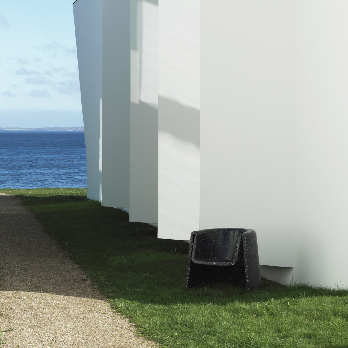 Bit Lounge Chair by Normann Copenhagen, showing big lounge chair in live shot.