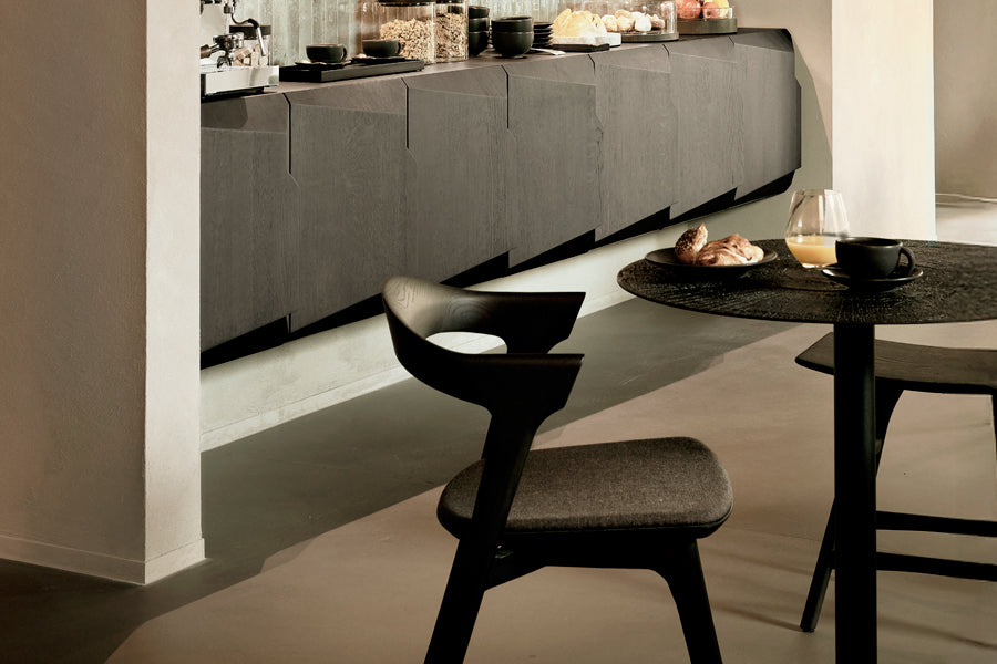 Blend Dining Table by Ethnicraft, showing closeup view of blend dining table in live shot.