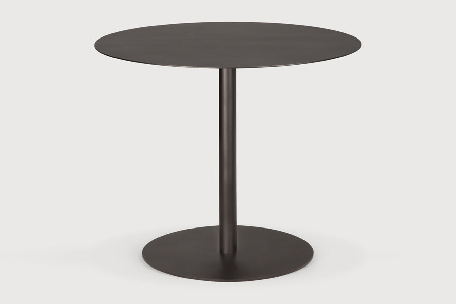 Blend Dining Table by Ethnicraft, showing blend dining table in studio shot.