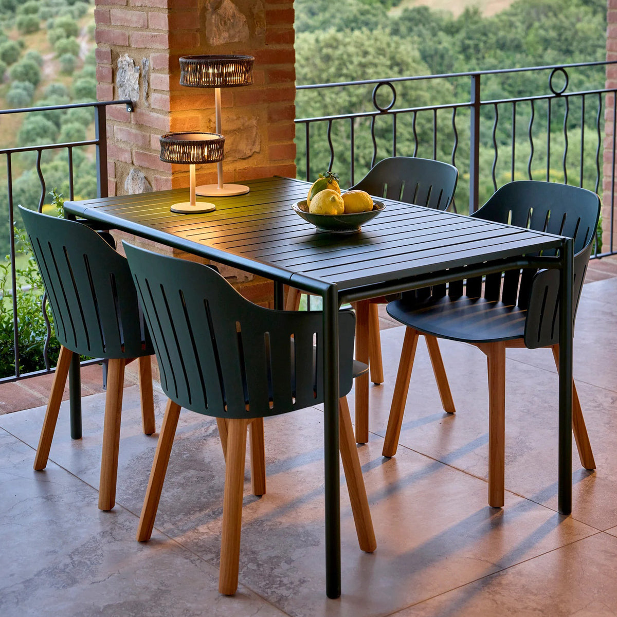 Bliss Dining Table by Cane-Line, showing bliss dining table in live shot.