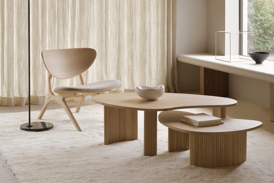Boomerang Coffee Table by Ethnicraft, showing boomerang coffee tables in live shot.