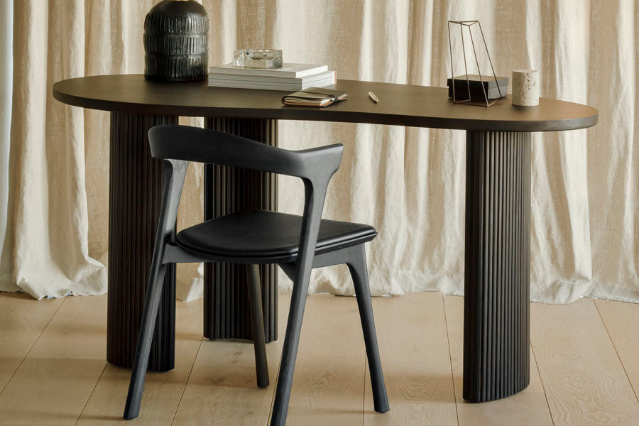 Boomerang Desk by Ethnicraft, showing boomerang desk in live shot.