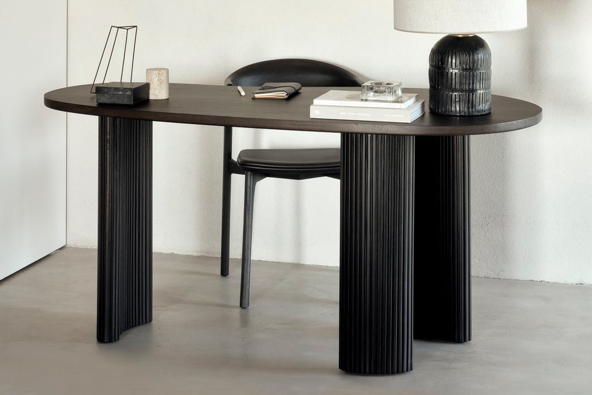 Boomerang Desk by Ethnicraft, showing boomerang desk in live shot.