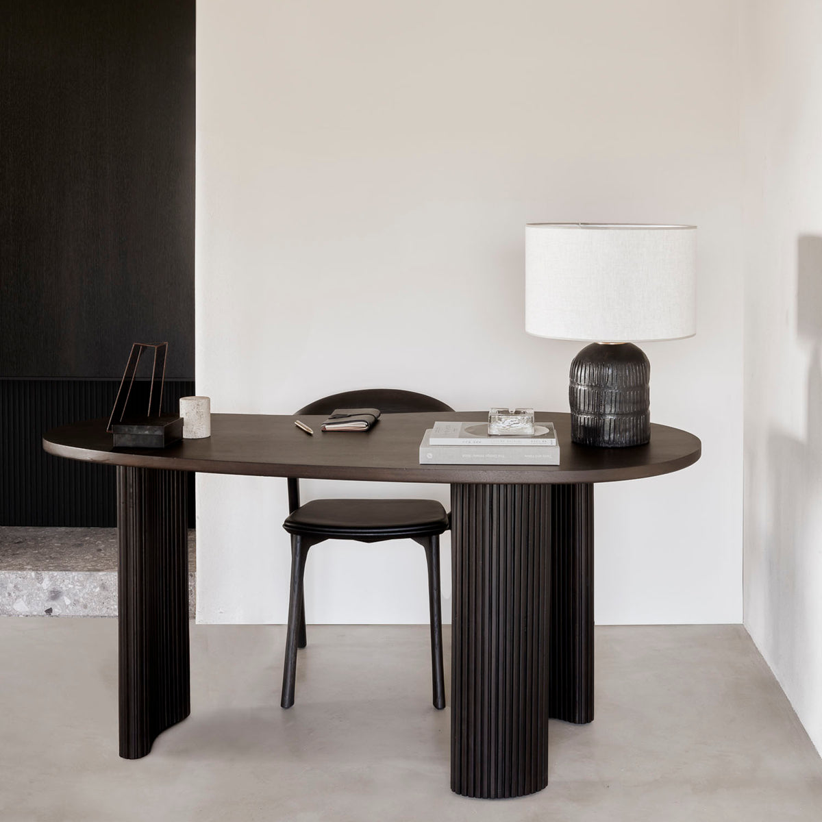 Boomerang Desk by Ethnicraft, showing boomerang desk in live shot.