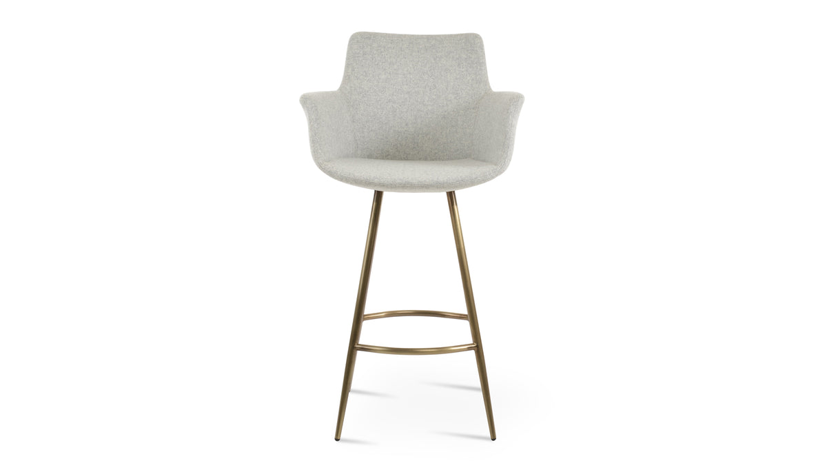 Bottega Galata Counter Stool by SohoConcept, showing front view of bottega galata counter stool in brass/camira blazer silver wool.