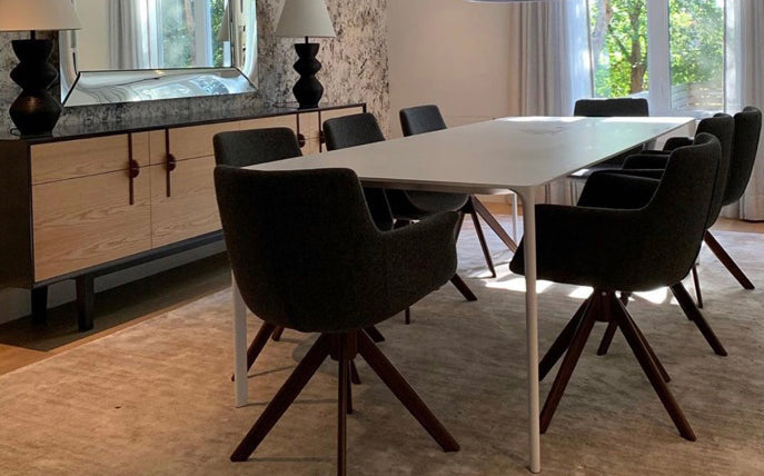 Bottega Sword Dining Armchair by SohoConcept, showing bottega sword dining armchairs with table in live shot.
