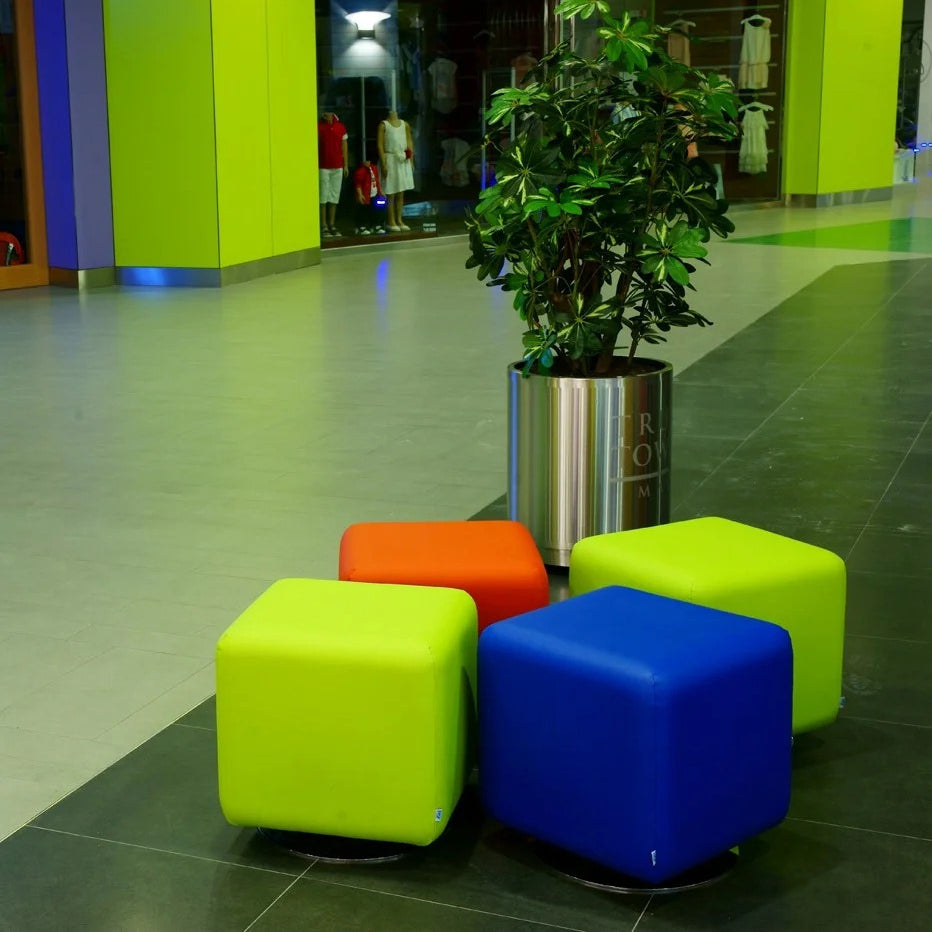 Boxer Swivel Ottoman by B&T, showing boxer swivel ottomans in live shot.