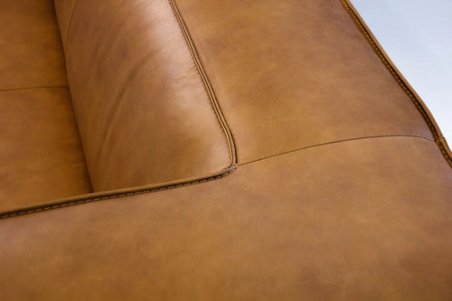 Brixton Sofa by Mobital, showing closeup view of brixton sofa in vintage whiskey leather.