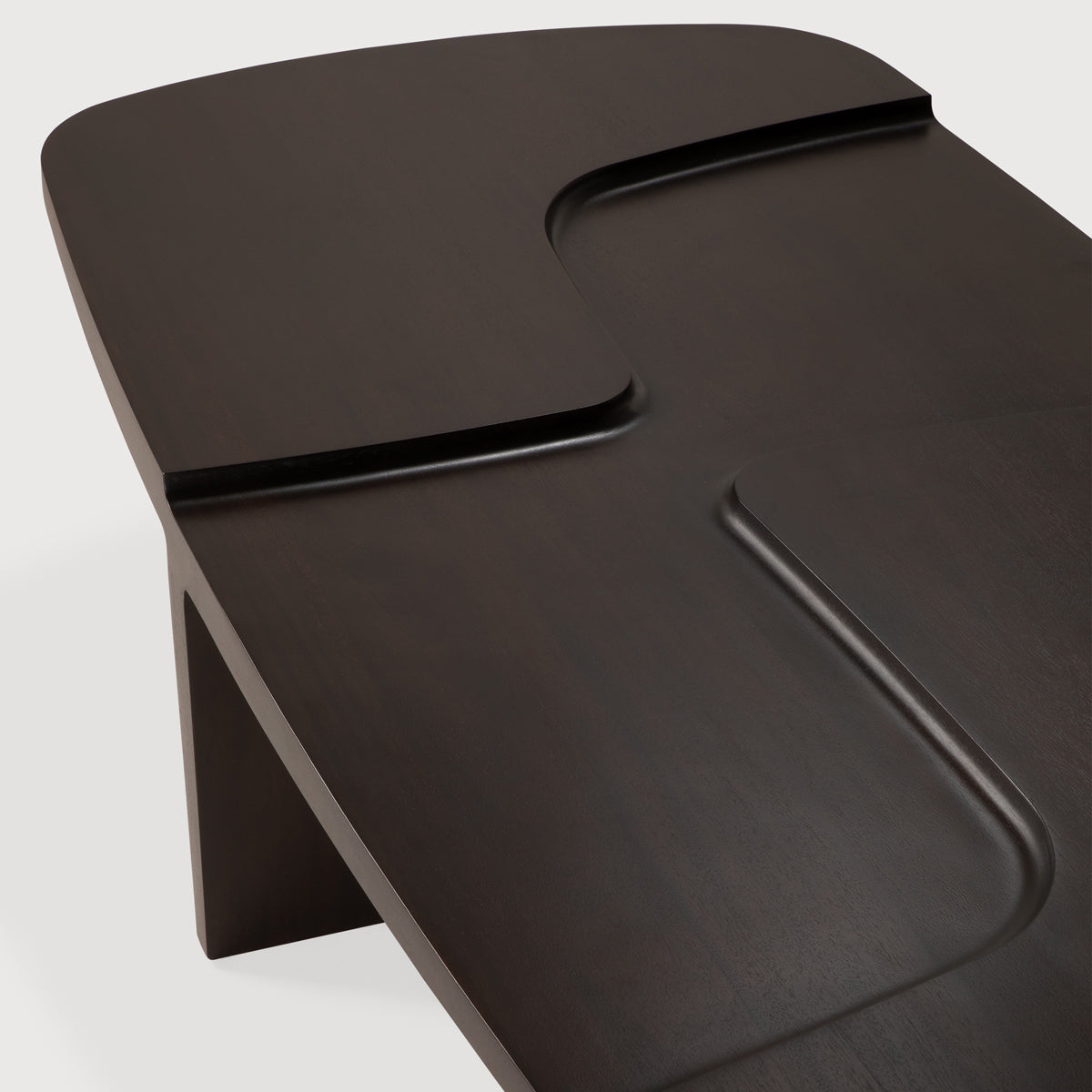 Brutalist Coffee Table by Ethnicraft, showing closeup view of brutalist coffee table in studio shot.