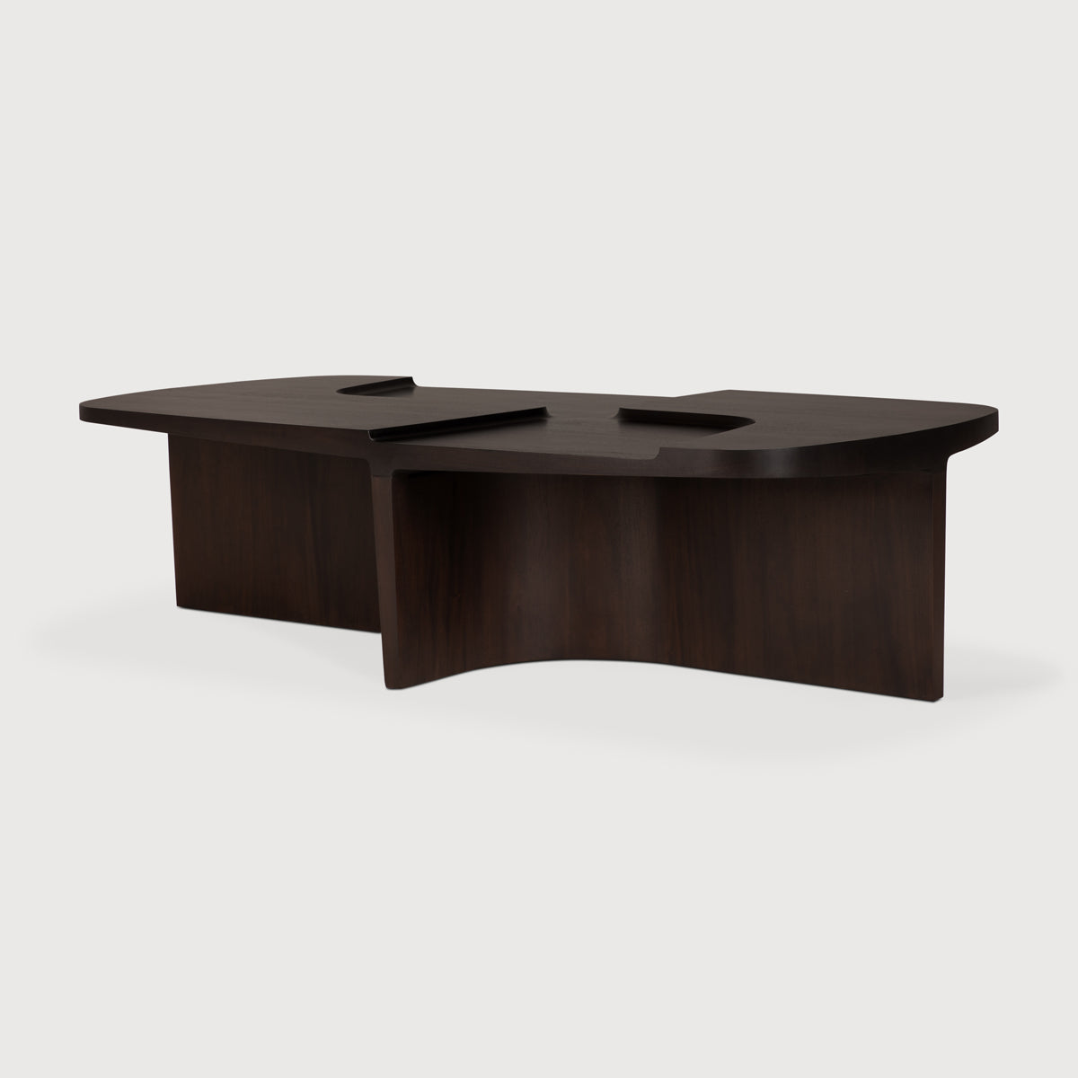 Brutalist Coffee Table by Ethnicraft, showing angle view of brutalist coffee table in studio shot.
