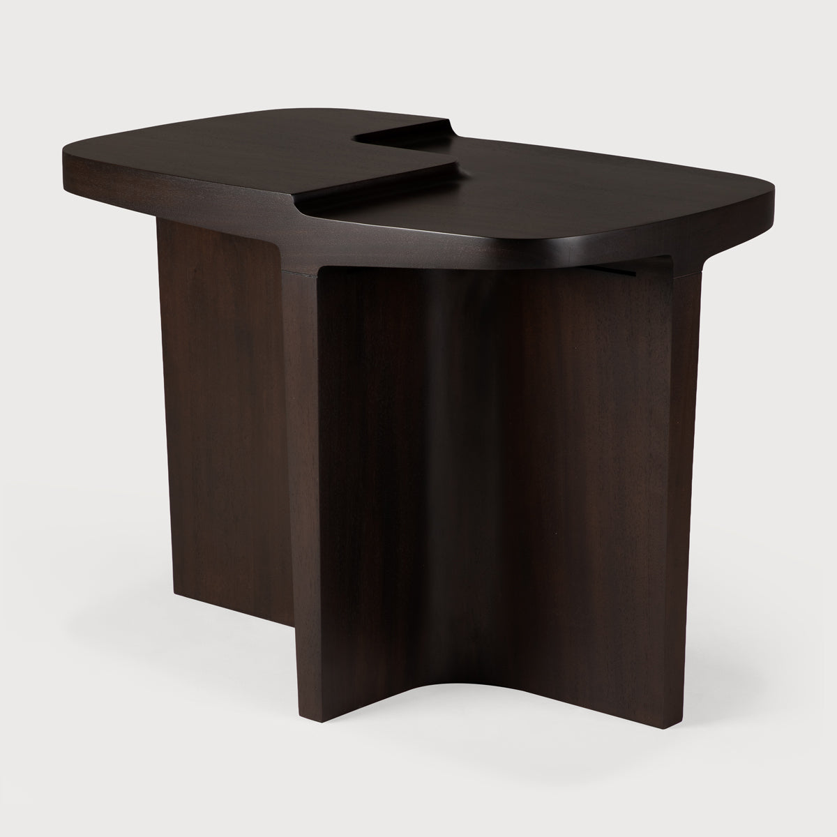 Brutalist Side Table by Ethnicraft, showing angle view of brutalist side table in studio shot.