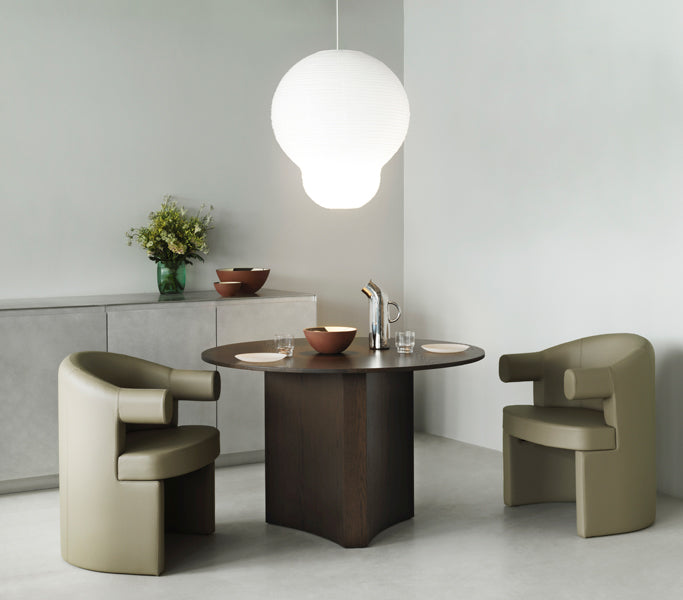 Burra Chair by Normann Copenhagen, showing burra chairs in live shot.