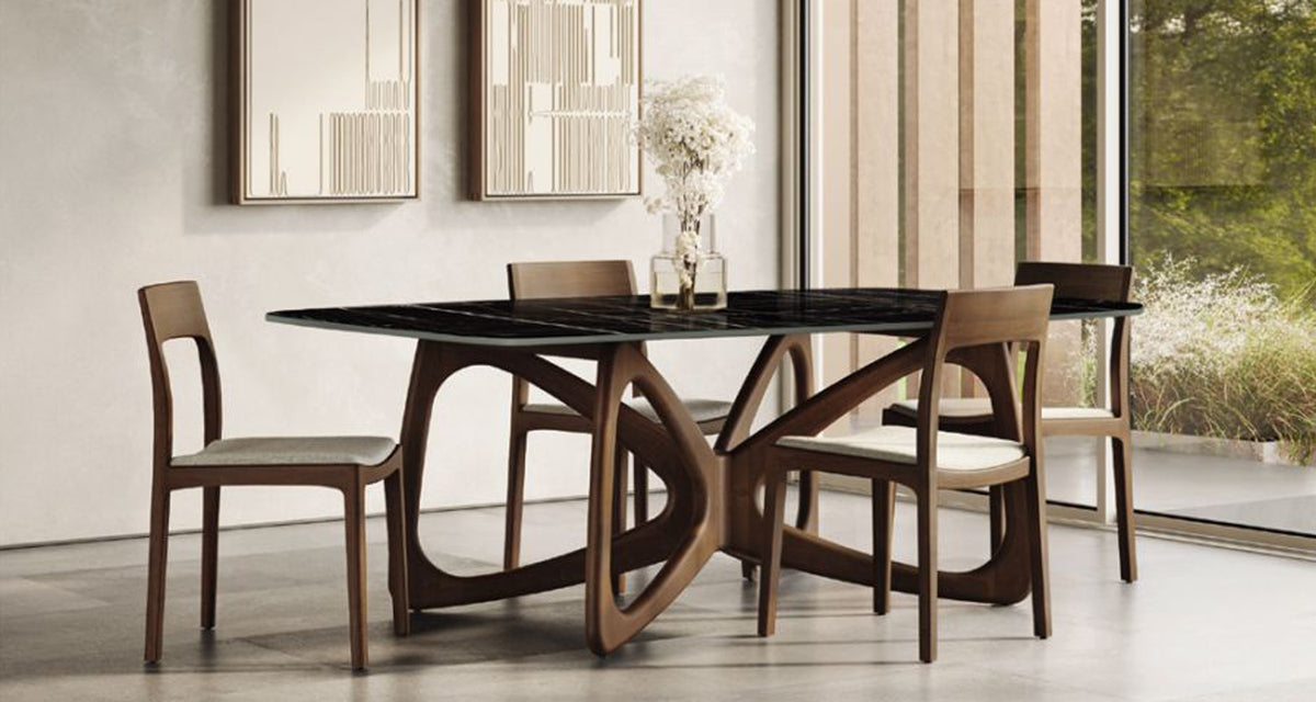 Butterfly Boat Shaped Stone Top Dining Table by Copeland Furniture, showing butterfly boat shaped stone top dining table in live shot.