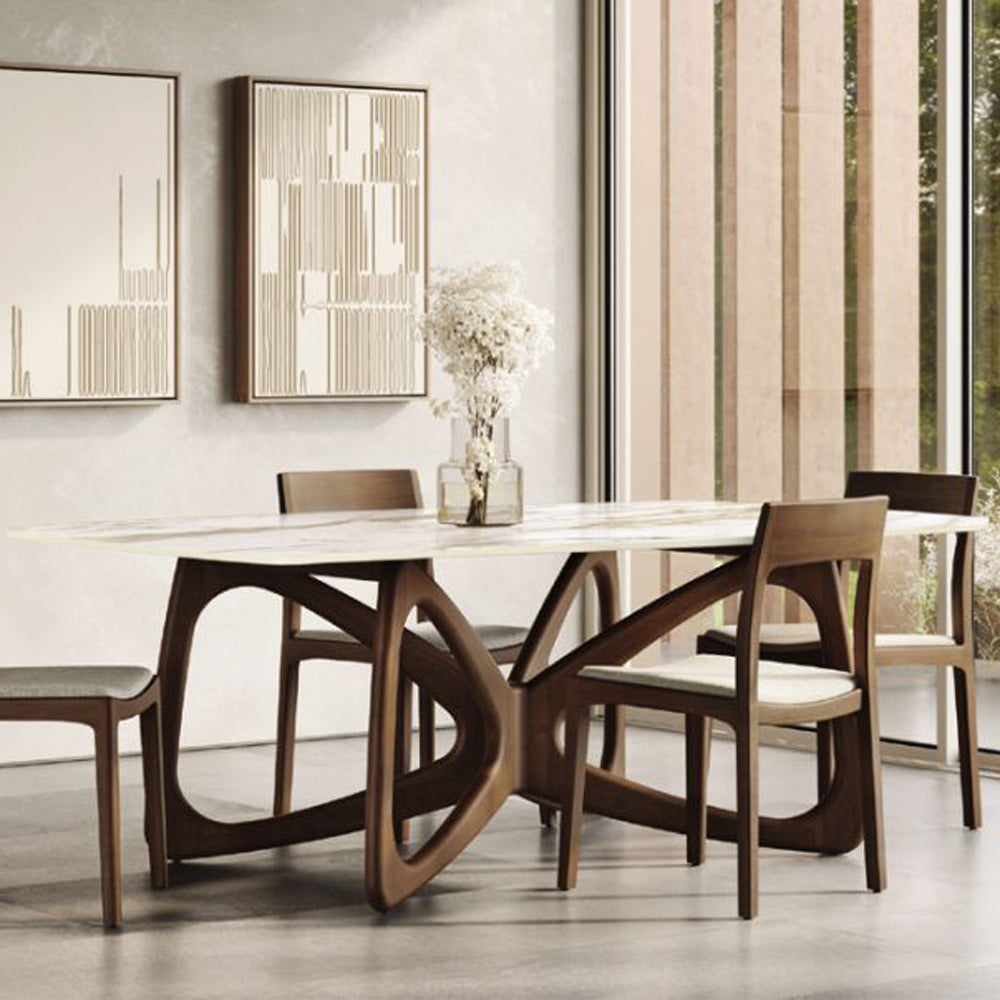 Butterfly Boat Shaped Stone Top Dining Table by Copeland Furniture, showing butterfly boat shaped stone top dining table in live shot.