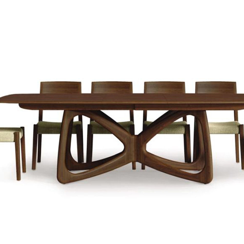 Butterfly Extension Dining Table by Copeland Furniture, showing butterfly extension dining table with chairs.