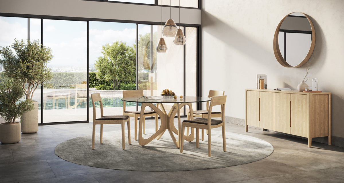 Butterfly Glass Top Round Dining Table by Copeland Furniture, showing  butterfly glass top round dining table in live shot.
