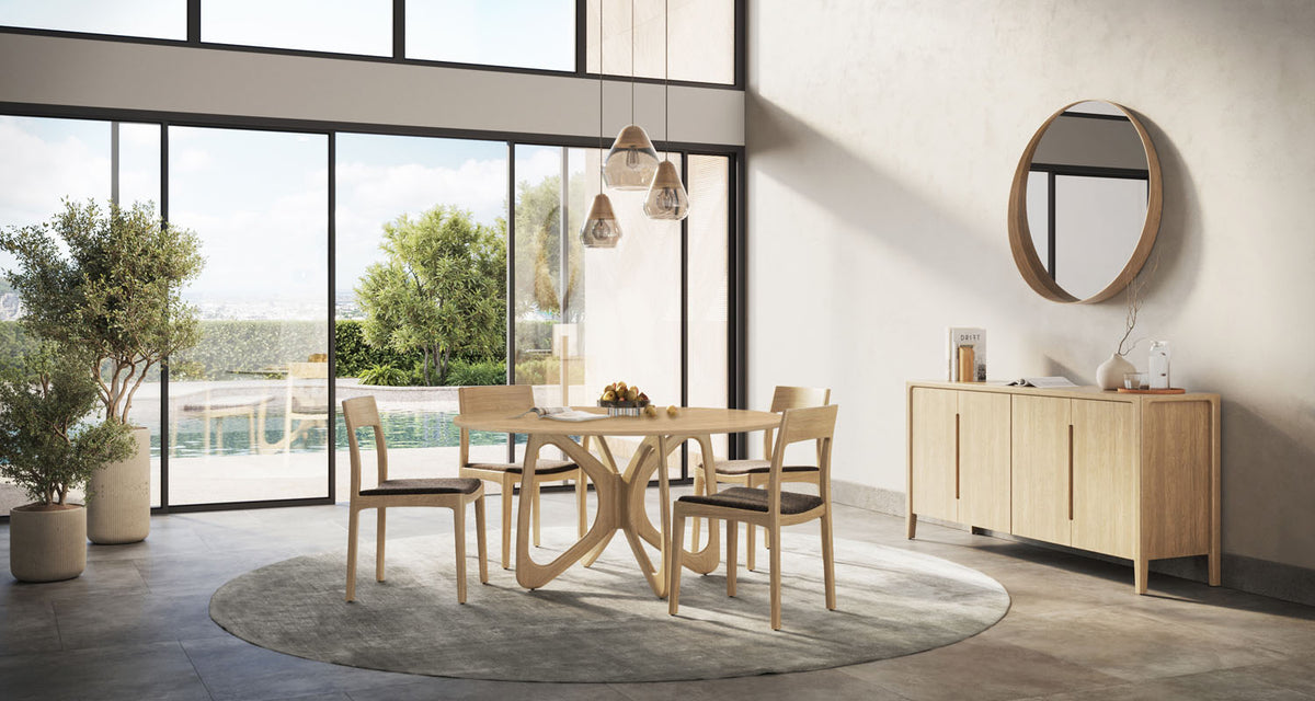 Butterfly Round Dining Table by Copeland Furniture, showing butterfly round dining table in live shot.