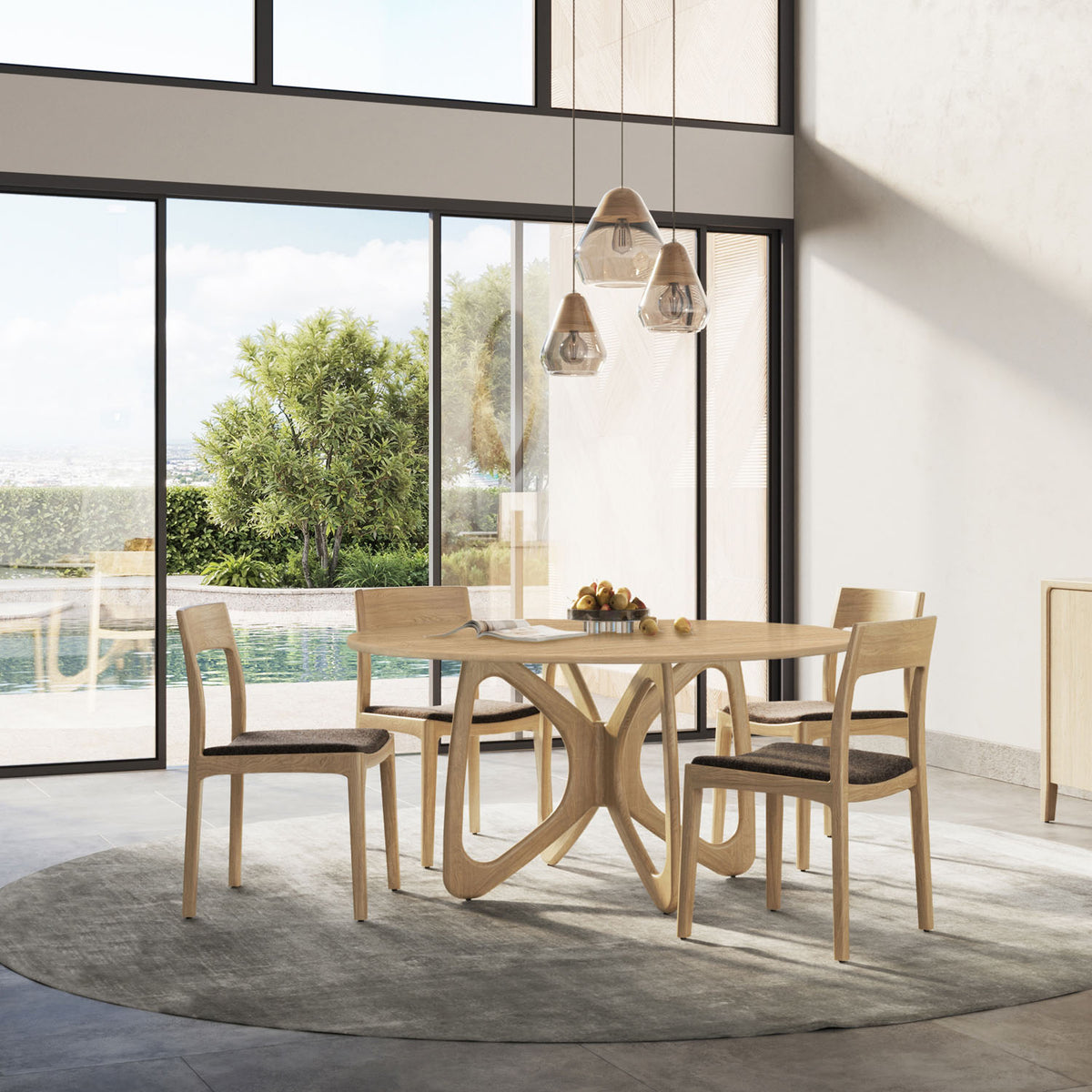 Butterfly Round Dining Table by Copeland Furniture, showing butterfly round dining table in live shot.