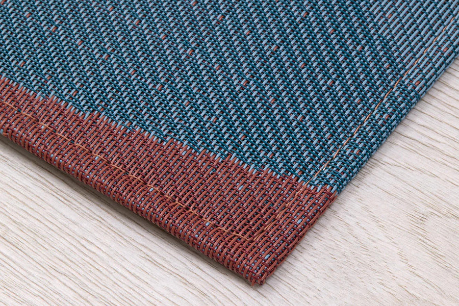 Canopy Woven Floor Rug by Chilewich, showing closeup view of canopy woven floor rug in live shot.