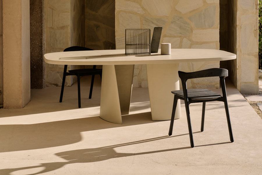 Canyon Outdoor Dining Table by Ethnicraft, showing canyon outdoor dining table in live shot.