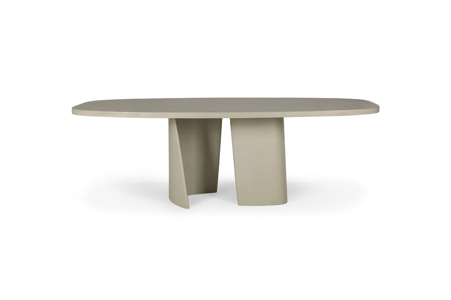 Canyon Outdoor Dining Table by Ethnicraft, showing front view of canyon outdoor dining table in oval/light grey varnished concrete.