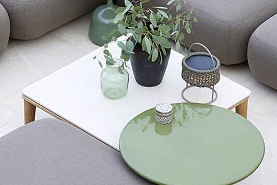 Capture Coffee Table by Cane-Line, showing closeup view of capture coffee table in live shot.