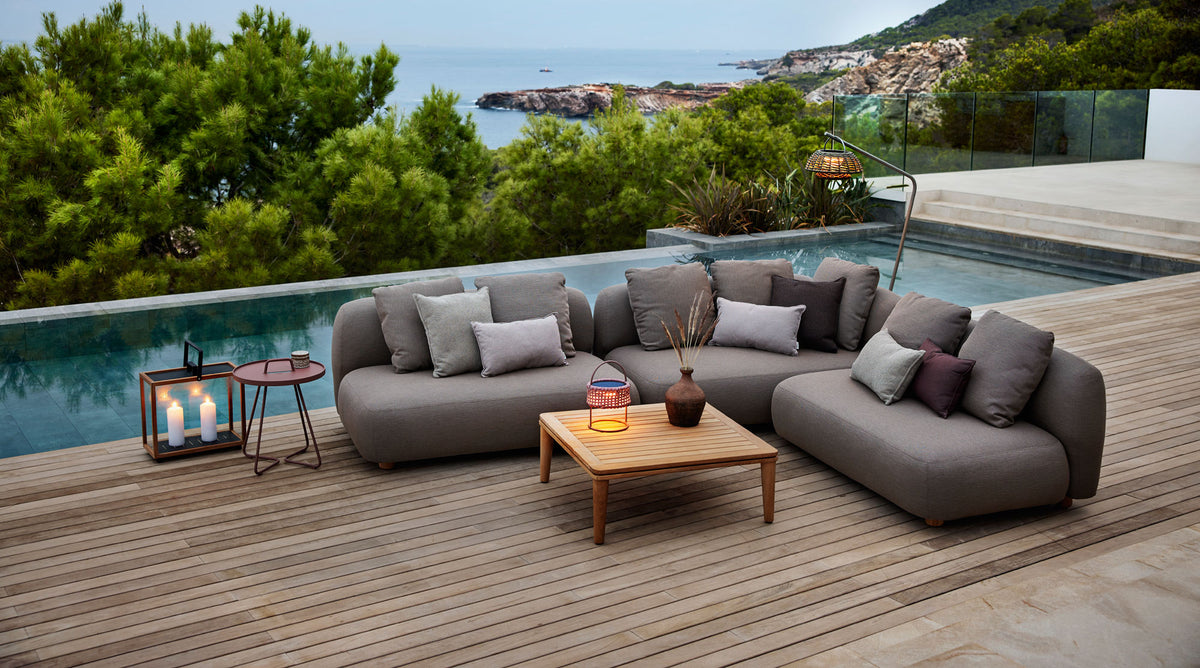 Capture Coffee Table by Cane-Line, showing capture coffee table in live shot.