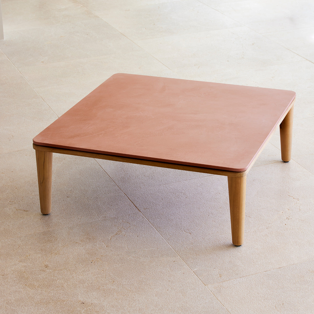 Capture Coffee Table by Cane-Line, showing capture coffee table in live shot.