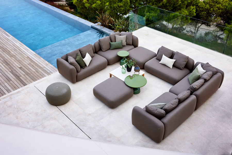 Capture Coffee Table by Cane-Line, showing capture coffee table in live shot.
