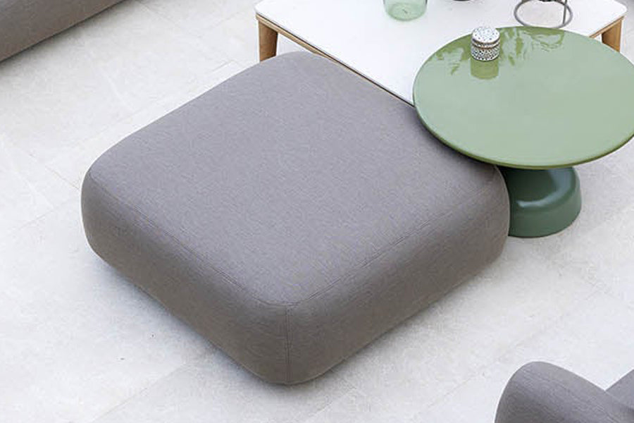 Capture Pouf by Cane-Line, showing closeup view of capture pouf in live shot.