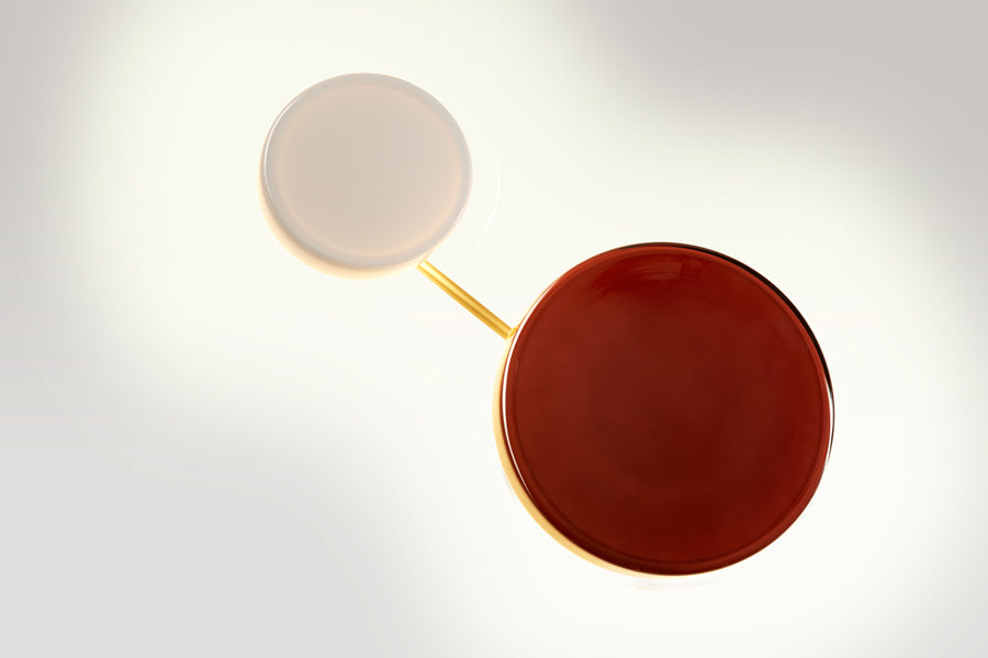 Caramel Wall Lamp by Marset, showing caramel wall lamps in live shot.