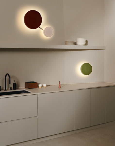 Caramel Wall Lamp by Marset, showing caramel wall lamps in live shot.
