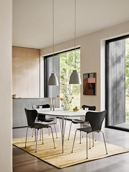 Caravaggio Pendant by Fritz Hansen, showing caravaggio pendants in live shot.